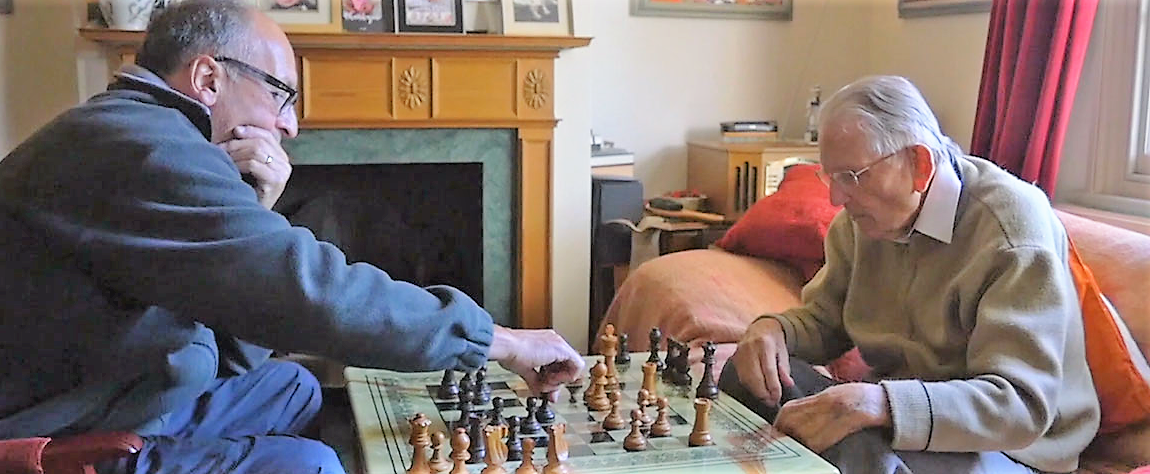 Two people playing chess