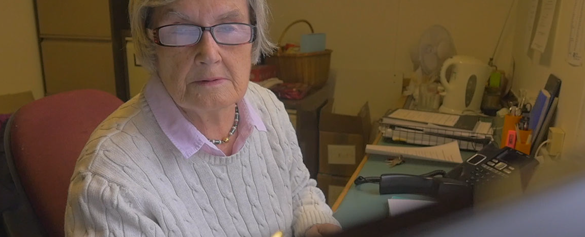 Lady sitting in an office